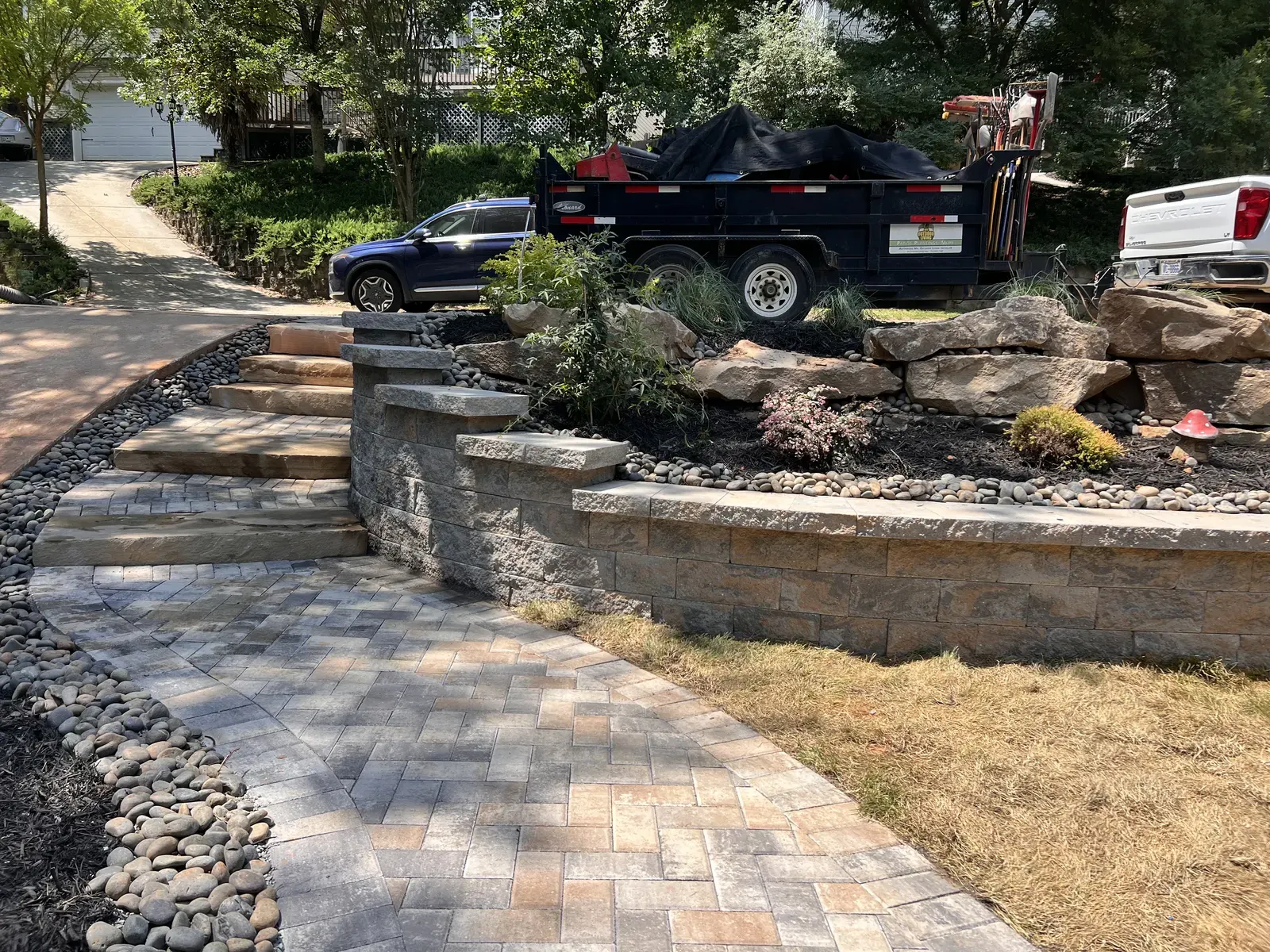 Elevate Your Landscape: The Benefits of Professional Retaining Wall Installation with Mr. Outdoor Living