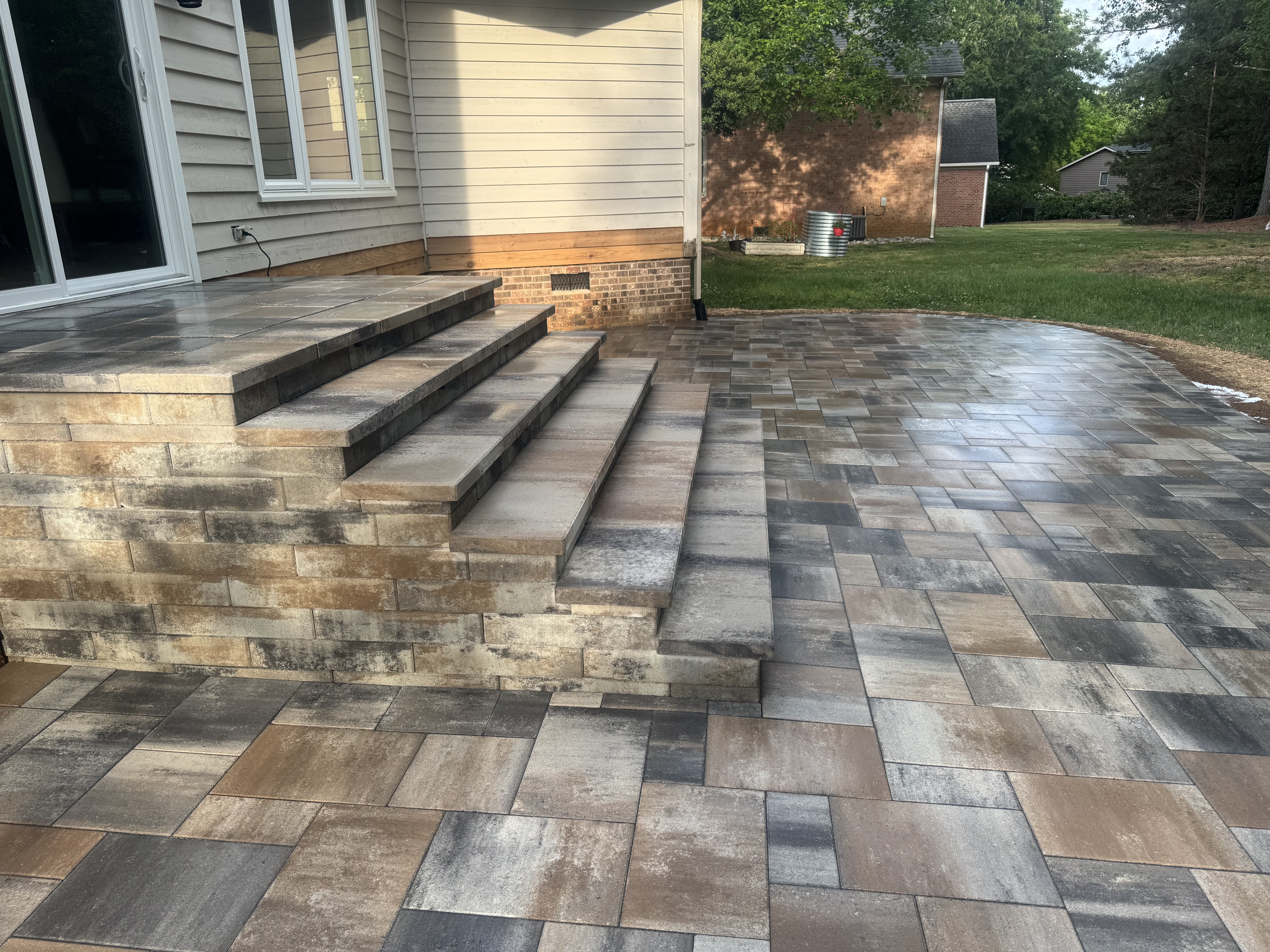 Elevate Your Outdoor Space: Expert Retaining Wall Installation Charlotte by Mr. Outdoor Living