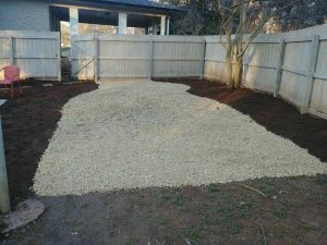 Drainage driveway with river rocks