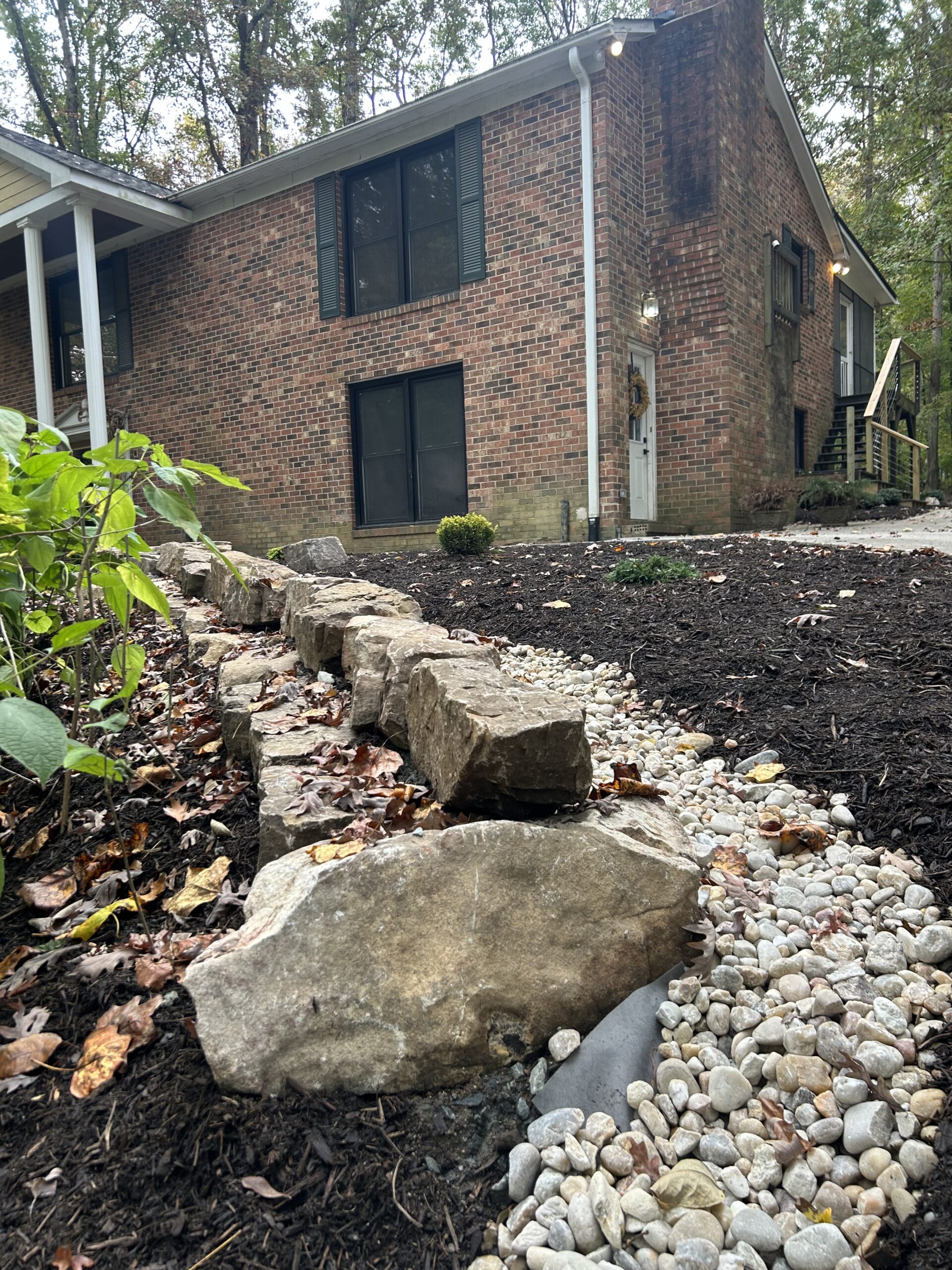 Boulders as retaining wall